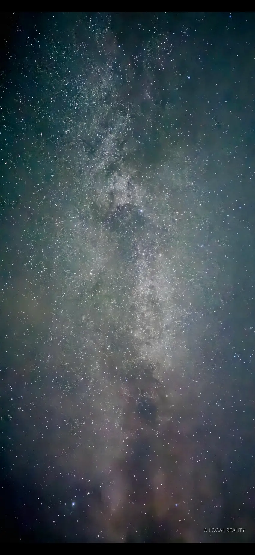 The dense band of the Milky Way across a dark sky